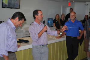 Mike Weir welcomed family friends to his new retail shop in Beamsville; Mike Weir Winery’s first such shop despite opening for business in 2005. Winery president Barry Katzman, left, and Lincoln Mayor Bill Hodgson listen attentively.  Williscraft - Photo
